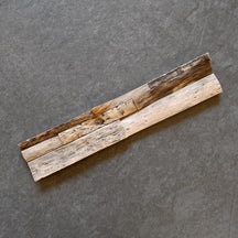 Holzpaneele aus Teakholz, 2x3x5 cm, als Verblender im natürlichen Holzdesign, von SEAWOOD auf einem Wandbild.